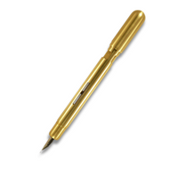 posted raw brass fountain pen on a white background