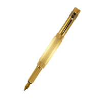 loclen F5 fountain pen in raw brass with the cap posted on a white background