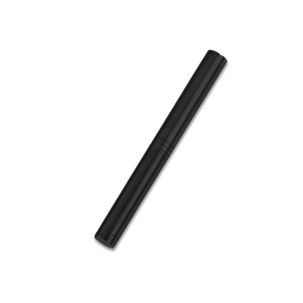 loclen tiny black fountain pen on a white background
